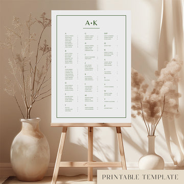 Printable alphabetical wedding seating chart sign on an easel with floral arrangements in a room setting.