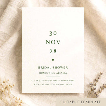 Minimal bridal shower invitation card on textured card on fabric background.