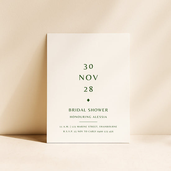 Modern bridal shower invitation card on a beige background.