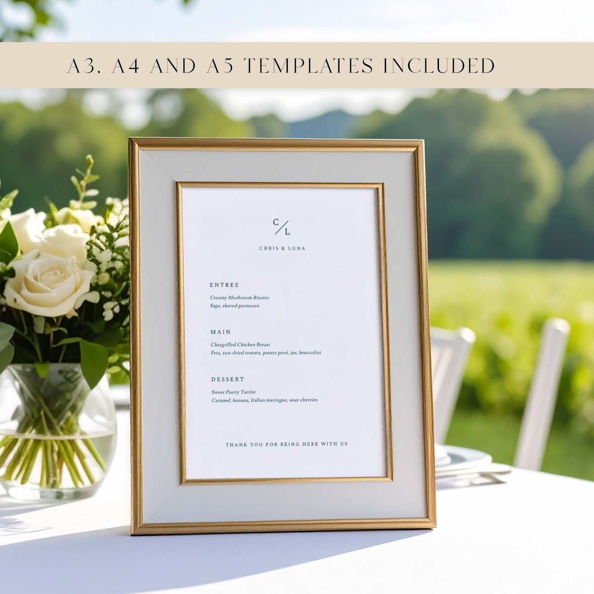 Printable wedding menu template in a gold frame on a soft pink tablecloth with dried florals and modern decorative accents.