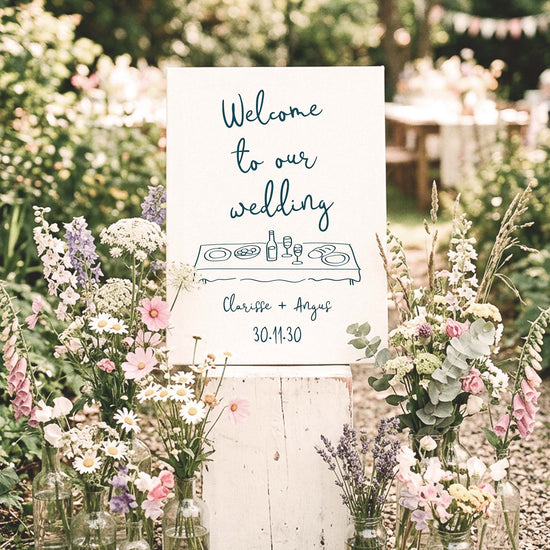 Whimsical wedding welcome sign template with hand-drawn illustration in a warm, informal wedding setting.