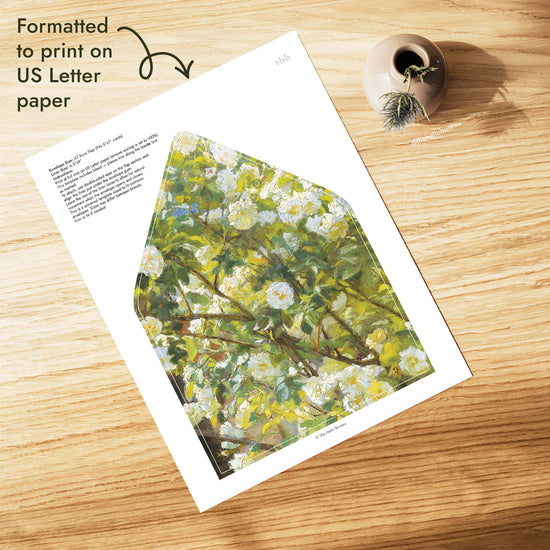 Printable vintage white roses envelope liner formatted for US Letter paper, sized for an A7 euro flap envelope that fits 5x7 wedding invitations, with soft brushwork in white, lemon and green, DIY and ready to print at home.