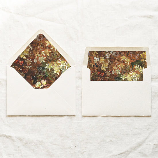 DIY vintage botanical envelope liners in a euro flap and a straight flap, painted in burnt orange, brown and cream with blackberries, for 5x7 autumn wedding invitations.